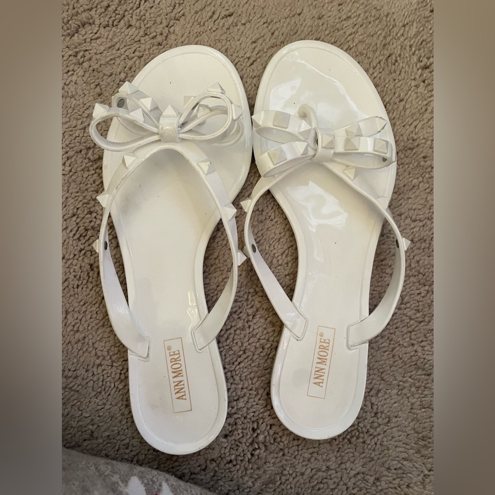 Ann More rubber flip flops with bow